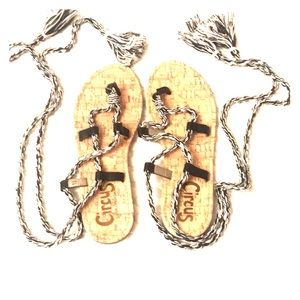 Black and white strap sandals.